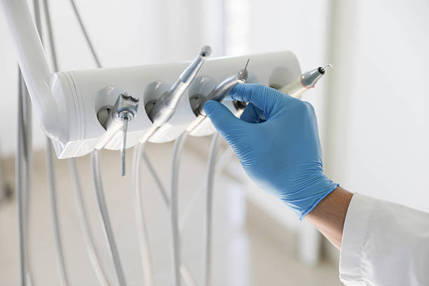 Professional Tooth Extraction technician working in Mebane, NC